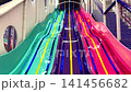 A bright children's attraction in the form of a slide with LED lighting. 141456682