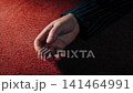 Man In Jacket Knocked Out Or Collapses On Carpet 141464991