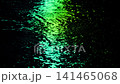 Rain On Road Surface Reflecting Neon Signs 141465068