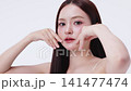 Beautiful young Asian woman with K beauty style makeup and perfect skin. Facial and skin care concept for commercial advertising. 141477474