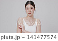 Slow motion of beautiful young Asian girl with k-beauty make up style on isolated white background for commercial beauty advertising. 141477574
