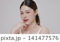 Slow motion of beautiful young Asian girl with k-beauty make up style on isolated white background for commercial beauty advertising. 141477576