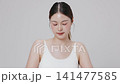 Slow motion of beautiful young Asian girl with k-beauty make up style on isolated white background for commercial beauty advertising. 141477585