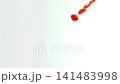 Abstract close-up of blood dissolving and dispersing in water, creating dynamic red swirls and fluid patterns, isolated on a white background, slow motion 141483998