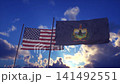 American and Vermont State Flags Waving Against Dramatic Cloudy Sky 141492551