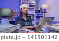 Injured young Asian office worker wearing head bandage while working on laptop in office, health and work pressure concept 141501142