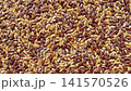 Camera flyover above raw flax seeds macro texture 141570526