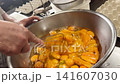 Whisk the egg mixture for the rolled omelet. 141607030