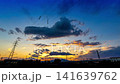鉄塔のある風景の夕焼け空_タイムラプス(上方移動) 鉄塔のある風景の夕焼け空_タイムラプス(上方移動) 141639762