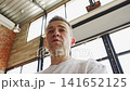 Man blogger shares tips on content creation in bright space 141652125
