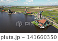 Aerial view of windmills in Zaanse Schans heritage park in Netherlands 141660350
