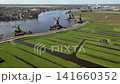 Drone view of windmills in Zaanse Schans heritage park in Netherlands 141660352