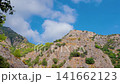 Timelapse: white clouds moving over rocky mountains near Fethiye 141662123