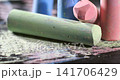 Chalk sticks in various colors on a black surface 141706429