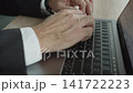 Man CEO check diagram online, closeup. Businessman work on laptop in office. Remote online working. Business success. Businessman using laptop in business office. Freelancer working online 141722223