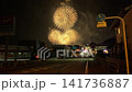 Fireworks rising at the end of the road 141736887