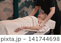 Neck Massage During Spa Treatment 141744698