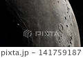 Close-Up of the Moon Surface With Craters and Shadowed Terminator Edge 141759187
