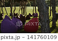 Soft seats are located on the lawn in the recreation area in the park 141760109