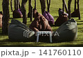Relaxation area in the park with soft seating for visitors 141760110