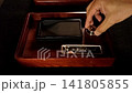 A moment of peace and relaxation before use traditional ink stick for writing or painting. 141805855