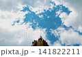 Japanese Temple Roof Timelapse Moving Clouds over Traditional Architectural Detail 4k Cinematic Low Angle Sky View Featuring Intricate Ceramic Ridge Tile Work in Motion 141822211