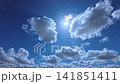 Clouds shining in the rising sun 141851411