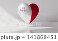 A heart shape is shown in red and white colors, flag of Malta. The heart is placed on a simple background with soft light. The focus is on the shape and colors in the scene 141868451