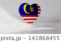 A heart shape appears in the center of the screen featuring the flag of Malaysia. The animation shows the heart rotating slowly against a plain background 141868455