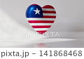 A heart is shown in 3D with the flag of Liberia wrapped around it. The colors and pattern are clear. The background is simple and bright 141868468