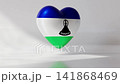 A heart shaped object displays the flag design of Lesotho with its blue, green, and white colors. The animation highlights the flags details and significance 141868469