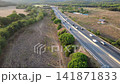 Carretera entre campos y bosques de la Costa Brava 141871833