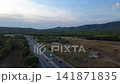 Carretera entre campos y bosques de la Costa Brava 141871835