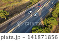 Carretera entre campos y bosques de la Costa Brava 141871856