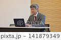 Senior man working on a computer Senior man working on a computer 141879349