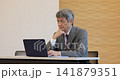 Senior man working on a computer Senior man working on a computer 141879351