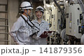 workers working in a factory workers working in a factory 141879356