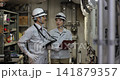 workers working in a factory workers working in a factory 141879357