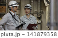 workers working in a factory workers working in a factory 141879358