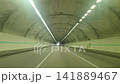 POV Driving View Inside a Highway Tunnel with Lights 141889467