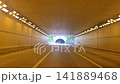 POV Driving View Inside a Highway Tunnel with Lights 141889468