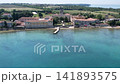 Aerial drone view of the historic abandoned Dajla monastery complex situated along the scenic Adriatic coast in Istria, Croatia. 141893575