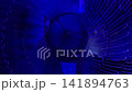 Fan turbine behind a blue surface.  141894763