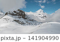 Zermatt Switzerland time lapse at Matterhorn mountain peak and Riffelsee lake in winter season 141904990