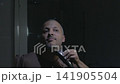 Barber Shaving Top of Head with Electric Clipper 141905504