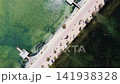 Aerial view of coastal promenade and turquoise sea in Spain 141938328