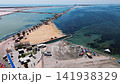Aerial of coastal salt flats and beach in Spain 141938329