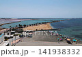 Aerial view scenic coastline people sunbath on the beach 141938332