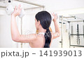 Women doing strength training: dumbbell training Women doing strength training: dumbbell training 141939013