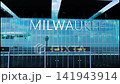 Airlane landing at Milwaukee, USA. Arrival in the city with reflection of airport and aircraft 141943914